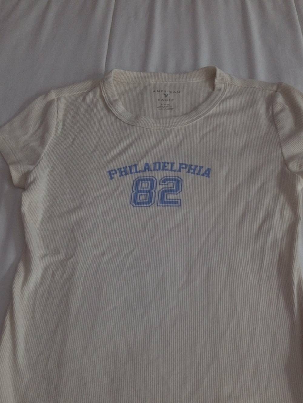 American Eagle Outfitters White Ribbed Tee with Blue 'Philadelphia 82' Graphic